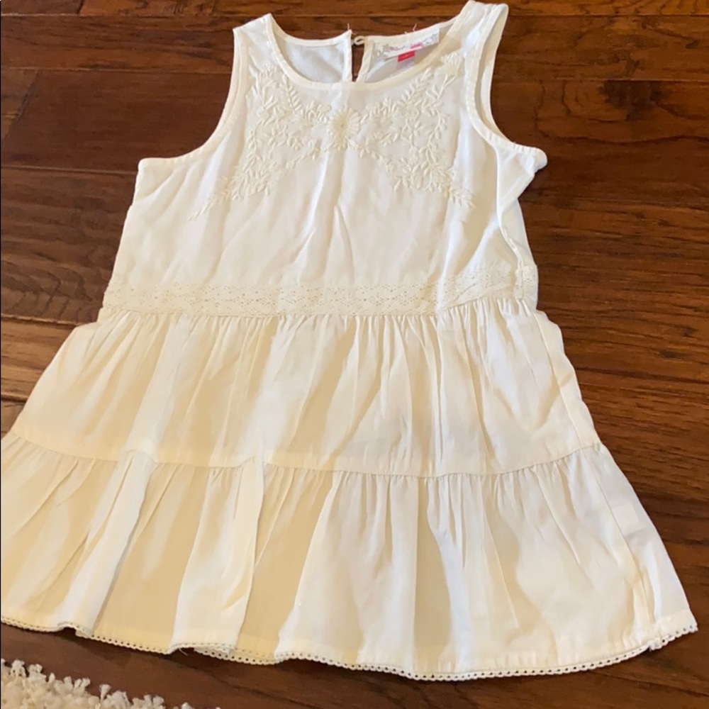 cream ruffled top